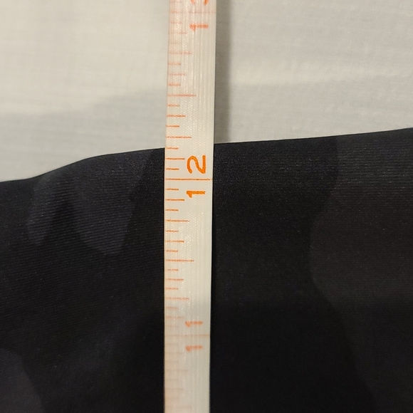 Practically brand new!  Athleta Ultimate 7/8 tights in black camo print. Size XS - Picture 4 of 9